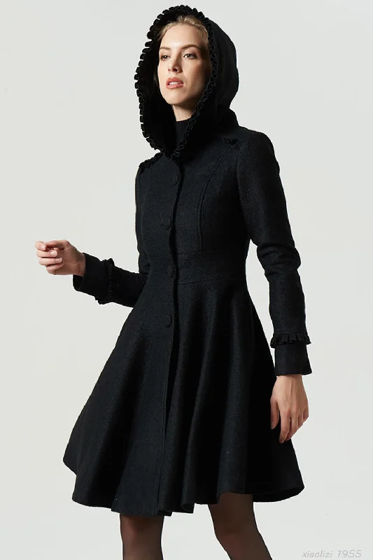 Stylish women’s coats for winter -short black wool coat with ruffle details 1955